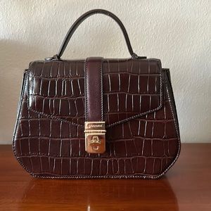 NWOT leather Brahmin convertible bag.  10” wide; 4 1/4” depth; 7 1/2” height.